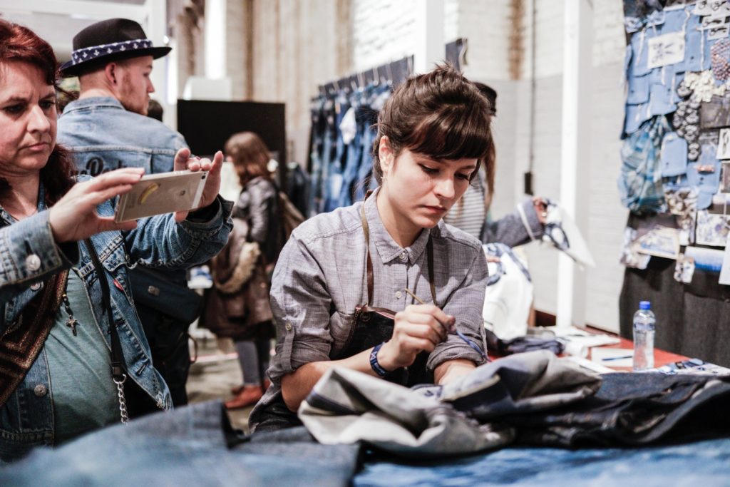 Amsterdam Denim Days, girl painting denim