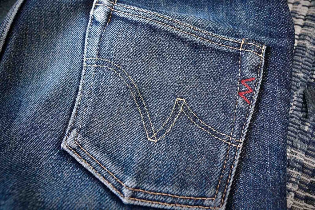 Stock image of 'Back pocket of blue jeans' | Jean pocket designs, Mens jeans  pockets, Sewing jeans